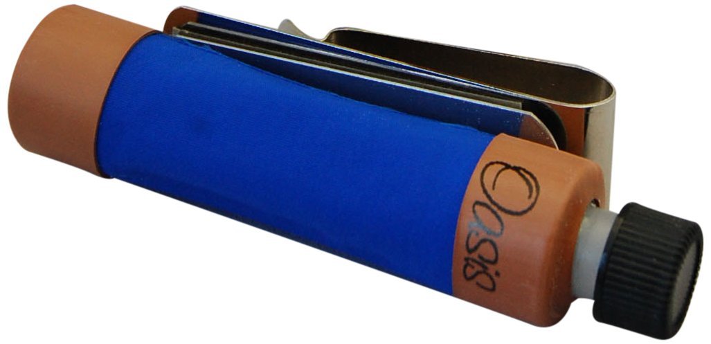 Oasis floral foam holder with blue fabric, brown ends, and metal clip
