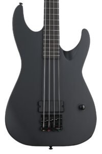 Black electric bass guitar with four strings, close-up shot