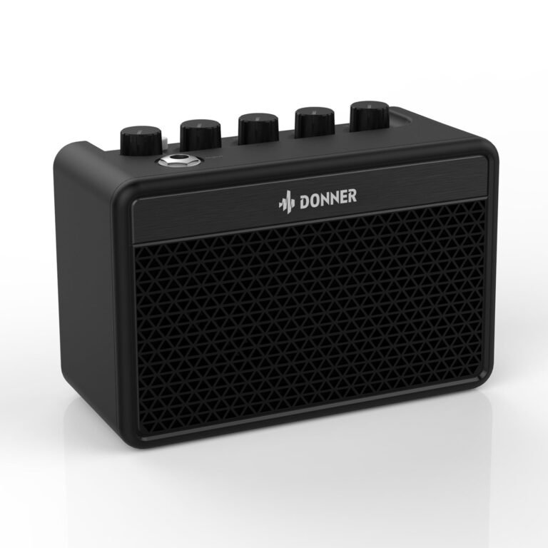 Black Donner guitar amplifier with knobs and triangular speaker grill