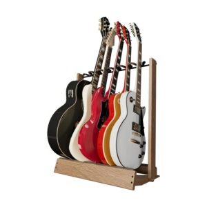 Six electric guitars on a wooden stand, various colors