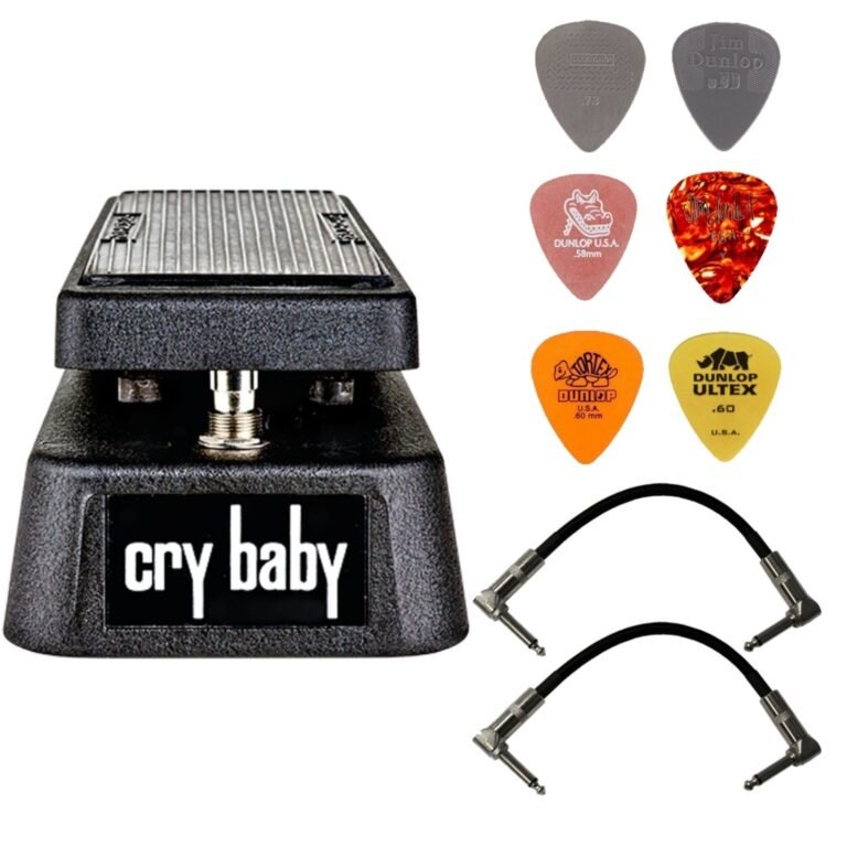 Cry Baby wah pedal with guitar picks and patch cables